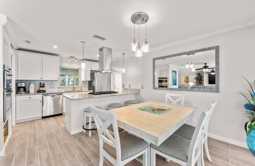 Rockledge House | Rockledge Oasis w/Screened Pool + Game Room, Near Cocoa Beach. Free EV charging
