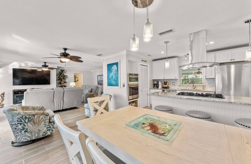 Rockledge House | Rockledge Oasis w/Screened Pool + Game Room, Near Cocoa Beach. Free EV charging