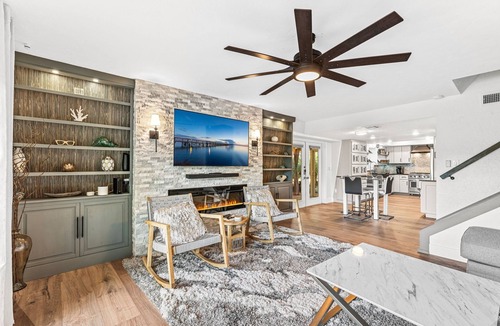 Tropic House | Rose's Riverside Chalet - 4BR Waterfront Escape - 4BR Waterfront Escape with Kayaks!