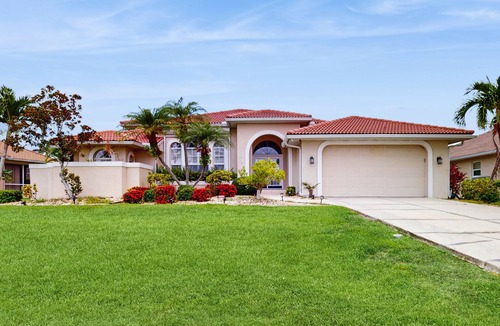 Burnt Store Isles House | Sailboat-Access Waterfront Retreat with Sunset Pool Living