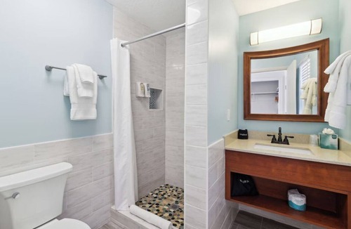 Neptune Beach Hotel | Salty Beachside Haven with Outdoor Swimming Pool and Stunning Ocean Views