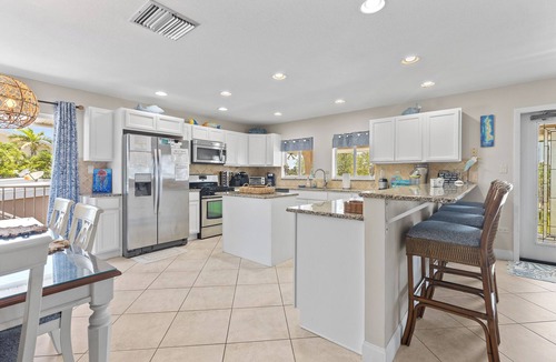 Key Colony Beach House | SandCastle. Upscale, Whole house. Upper and Lower side. Private Pool, 75 Ft Dock
