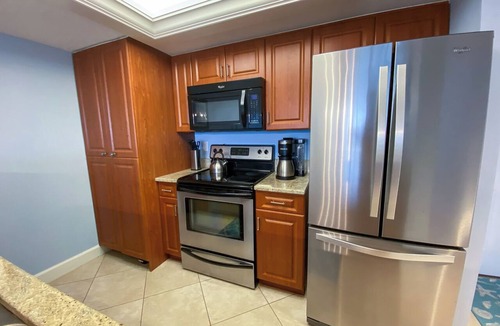 Punta Rassa Condo | Sanibel Harbour Resort: Harbour Tower 711 Updated beachfront condo with wrap-around lanai.