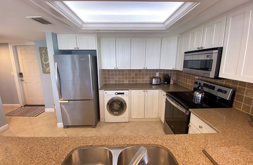 Punta Rassa Condo | Sanibel Harbour Resort 237: Experience the sunsets on this Waterfront wrap around lanai