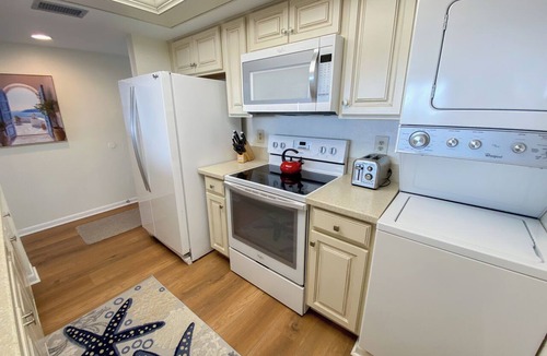 Punta Rassa Condo | Sanibel Harbour Resort - 314: Stylish condo steps away from private beach.