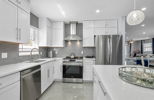 Naples Park House | Sea Breeze Paradise - Walk to Vanderbilt Beach and Mercato, Heated Pool Home