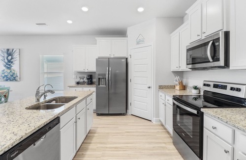 Port St. Joe House | SEA SMILE offers amazing sunsets, amenities galore & mother-in-law suite! Snowbirds welcome