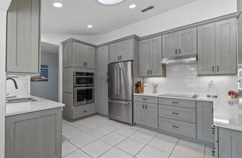 Palm Harbor House | Sea Stone Waterfront Pool Home | Boat Dock | Close to Golf | Heated Pool | Dog Friendly