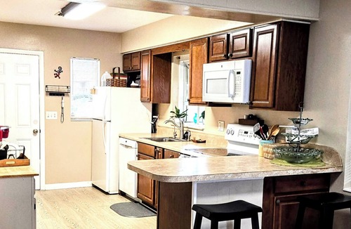 Winter Haven Apartment | Serene, Cozy, Lakefront Home with boat dock and Large Screened in porch!