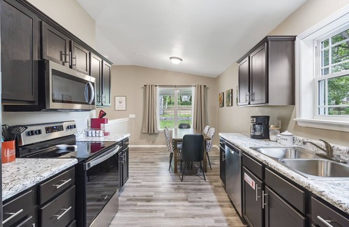 Downtown Branson House | Short Walk to Downtown Branson & Branson Landing with Private Hot Tub & Free Tickets