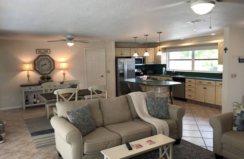 Singer Island House | Single open-concept home one block from the ocean with heated pool and lanai