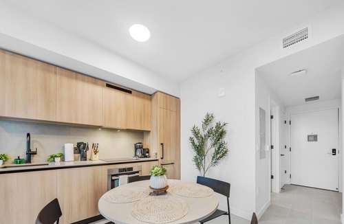 Downtown Miami Apartment | Sleek 1-BR & Den in Central Downtown