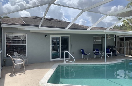 South Pointe of Tampa House | Solar panels for pool heat and a solar blanket as well. Some dog breeds allowed.