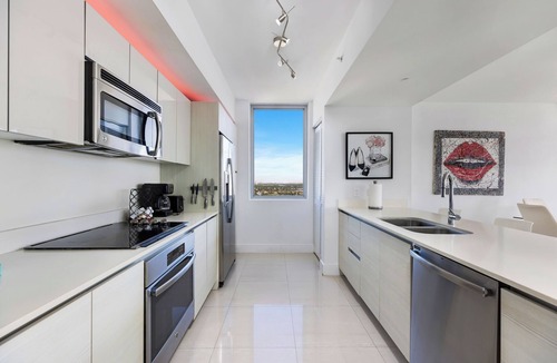 Hallandale Beach Apartment | ★ Sophisticated Miami Retreat at Beachwalk with Balcony-25 min to MAJOR INTERNATIONAL SPORTING EVENT!