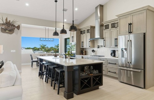 Key Colony Beach House | Southern Palms -Luxury 5 Bd/6 Bath waterfront home on wide canal in Key Colony Beach, private pool and hot tub, 32' Dockage, Minutes to Atlantic Ocean, Easy Access.Newer Construction. Ice Maker, All Bedrooms with Ensuite Bathrooms, Stunning water views