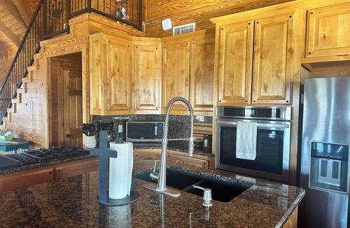 Caddo House | Spacious 4-bedroom 4-bath home in the country on 10 acres.