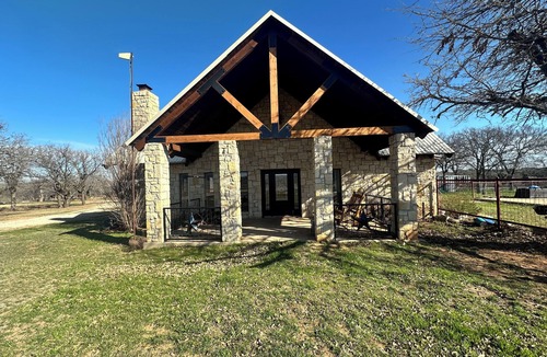Caddo House | Spacious 4-bedroom 4-bath home in the country on 10 acres.