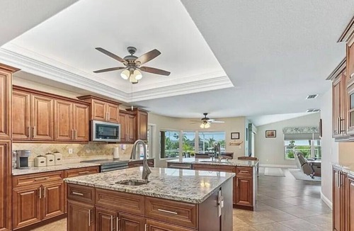 Caloosahatchee House | Spacious 4-bedroom house in charming Cape Coral neighborhood.