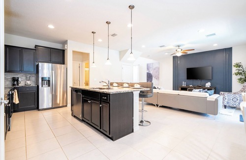 Four Corners House | Spacious 5BR Oasis at Windsor at Westside – BBQ, Pool – Perfect for Families!
