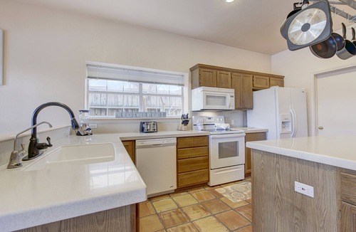South Padre Island House | Spacious Bayside Retreat with Large Heated Pool & Hot Tub!