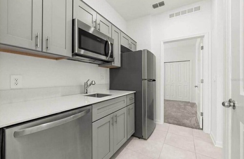 Winter Haven House | Spacious Modern 4BR Pool Oasis Near Legoland w/Mother-In-Law Suite/Private Apt