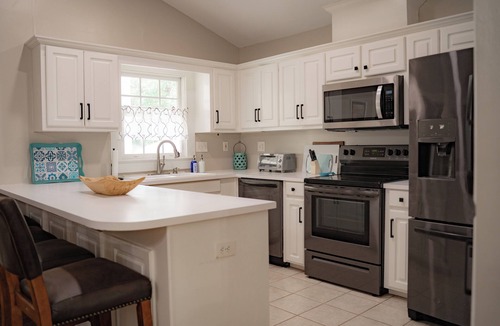 Fortson House | Spacious North Columbus 4-bedroom 3 bathroom home perfect for large groups