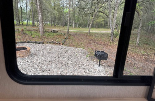 Brooksville House | Spacious RV. 10ft ceilings! Full home size kitchen & Outside firepit and grill!