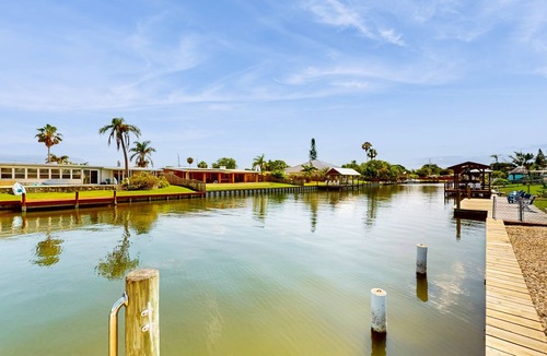 Venetian Way House | Spacious waterfront home with private pool, sunroom and dock.