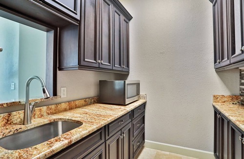Waterway Park House | Sprawling intercoastal home with boat lifts, pool and hot tub