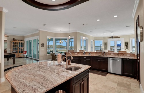 Waterway Park House | Sprawling intercoastal home with boat lifts, pool and hot tub