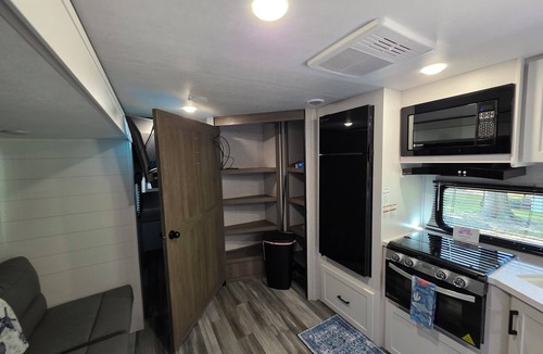 Bell House | Stay at The Rusty Hooker a Cozy Camper in Perry Fl