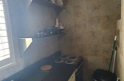 Hollywood South Central Beach Condo | Steps to the famous Hollywood Beach Sand and Broadwalk