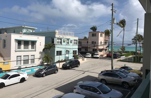Hollywood South Central Beach Condo | Steps to the famous Hollywood Beach Sand and Broadwalk