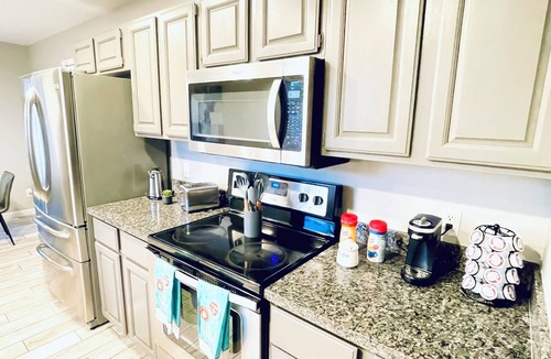 Villa De Paz House | StoneHeart Hidden Gem is a 3-bedroom house in Phoenix with AC, WiFi & Pool