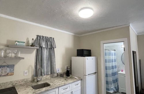 Whitney Beach Hotel | Studios near AMI Beach, Fully Furnished, Kitchenette, Enclosed Lanai”