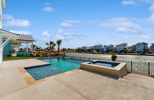 Rockport House | Stunning bay front home w private, heated pool & hot tub - fishing & boating hub