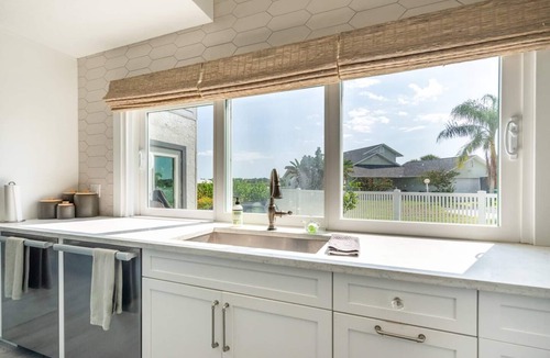 Indian Harbor Estates House | Stunning Luxury Riverfront Pool Home with Boat Dockage
