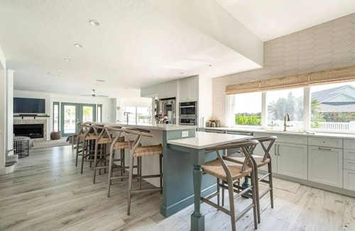 Indian Harbor Estates House | Stunning Luxury Riverfront Pool Home with Boat Dockage