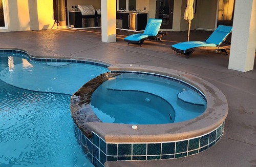Grant-Valkaria House | Stunning Mediterranean-style vacation home w/ fabulous spillover hot tub/pool!