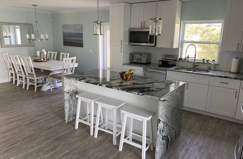 North Naples House | Stunning Waterfront Retreat with Private Pool and beautiful entertaining space.