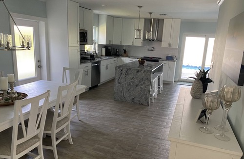 North Naples House | Stunning Waterfront Retreat with Private Pool and beautiful entertaining space.