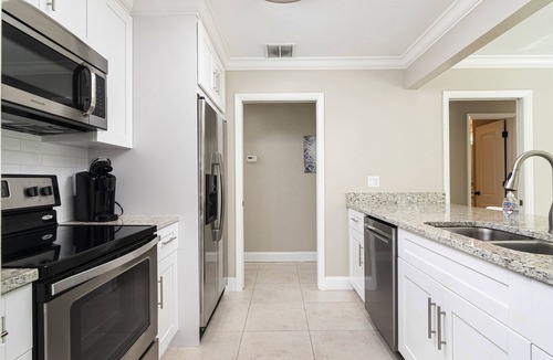 Naples Park House | Summer Specials! Cute Designer Home, Heated Pool, Close to the Beach, FREE Bikes
