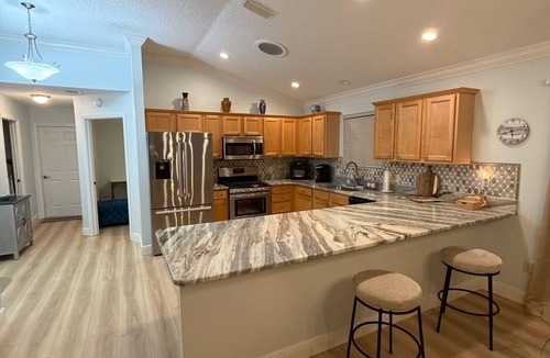 Sabal Chase Villa | Sunny Days 3-bedroom villa 1 mile S of Lake Sumter! Golf Cart Included!