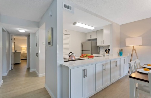 Avon By The Sea Condo | Sunny Shores Retreat w/Pool, Balcony & Steps to Ocean!