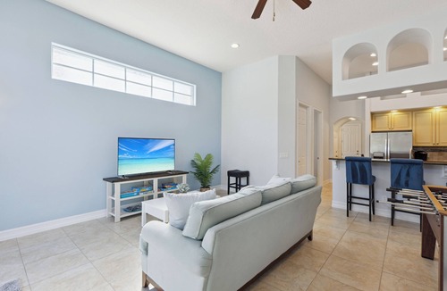 Indian Harbour Beach House | Sunny Townhome w/nearby Beach, Private Yard, Pingpong & Pool!
