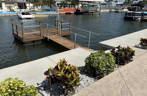 Hudson Beach Estates House | Sunny Waterfront Oasis! Private Pool, Hot Tub & Dock!