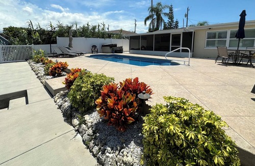 Hudson Beach Estates House | Sunny Waterfront Oasis! Private Pool, Hot Tub & Dock!