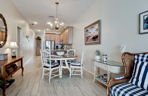 Bradenton Beach Condo | SUNSETS AND DOLPHIN SHOWS AWAIT FROM YOUR BALCONY! Availability is going quick, call today and book your Winter vacation!