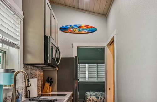 Dunedin House | Surf Shack Tiny Home on Pinellas Trail w/Heated Pool! Walk or Bike to Downtown Dunedin!