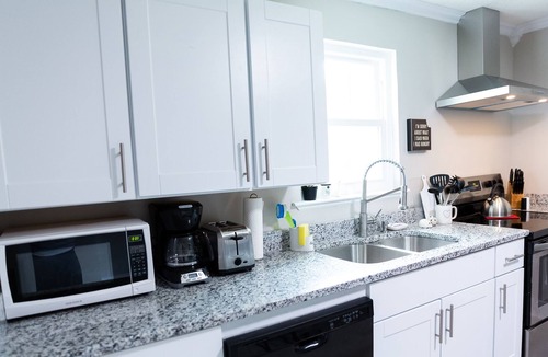 Ringgold House | Sweet Peach Bungalow 2BR + laundry. One mile from I-75 yet quiet. Newly updated.